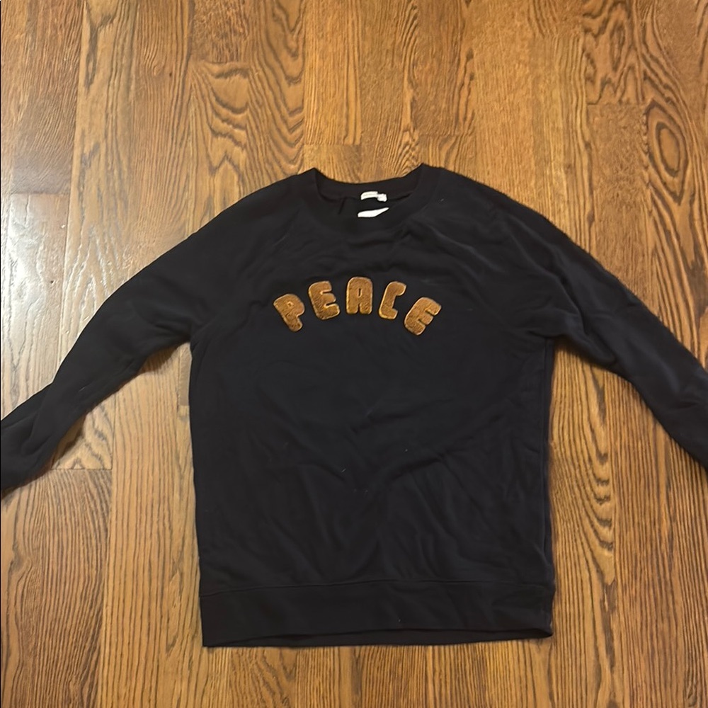 American Eagle Outfitters Black Sweater with Brown Peace Design